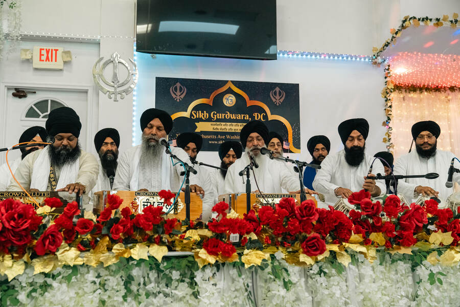 Sangat gathered inside the Gurdwara hall